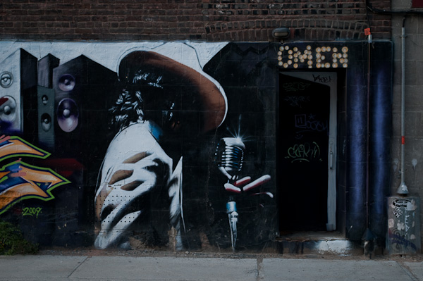 closeup of Omen half of street mural